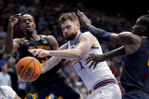 West Virginia upsets No. 7 Kansas, ends 11-game losing streak inside Allen Fieldhouse